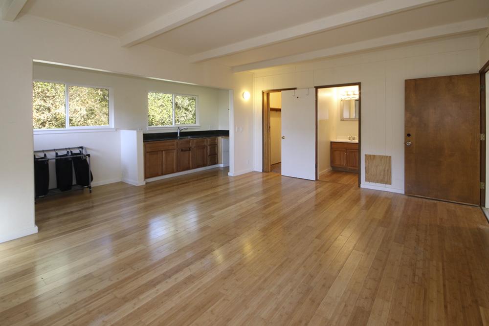 125 Charman Hill Road Aptos, CA 95003 - Photo 21 of 22 a view of an empty room with window and wooden floor
