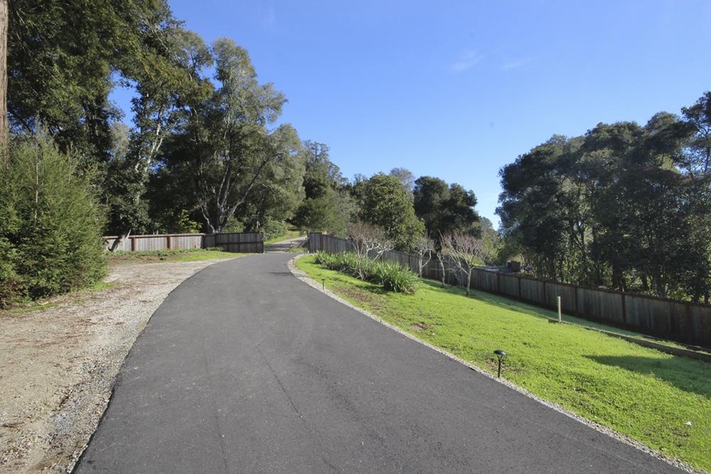 125 Charman Hill Road Aptos, CA 95003 - Photo 3 of 22 a view of a road with a yard