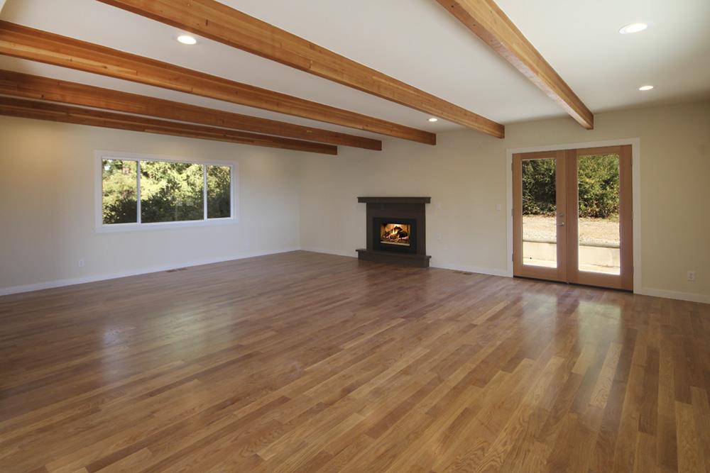 125 Charman Hill Road Aptos, CA 95003 - Photo 9 of 22 a view of empty room with wooden floor and fan