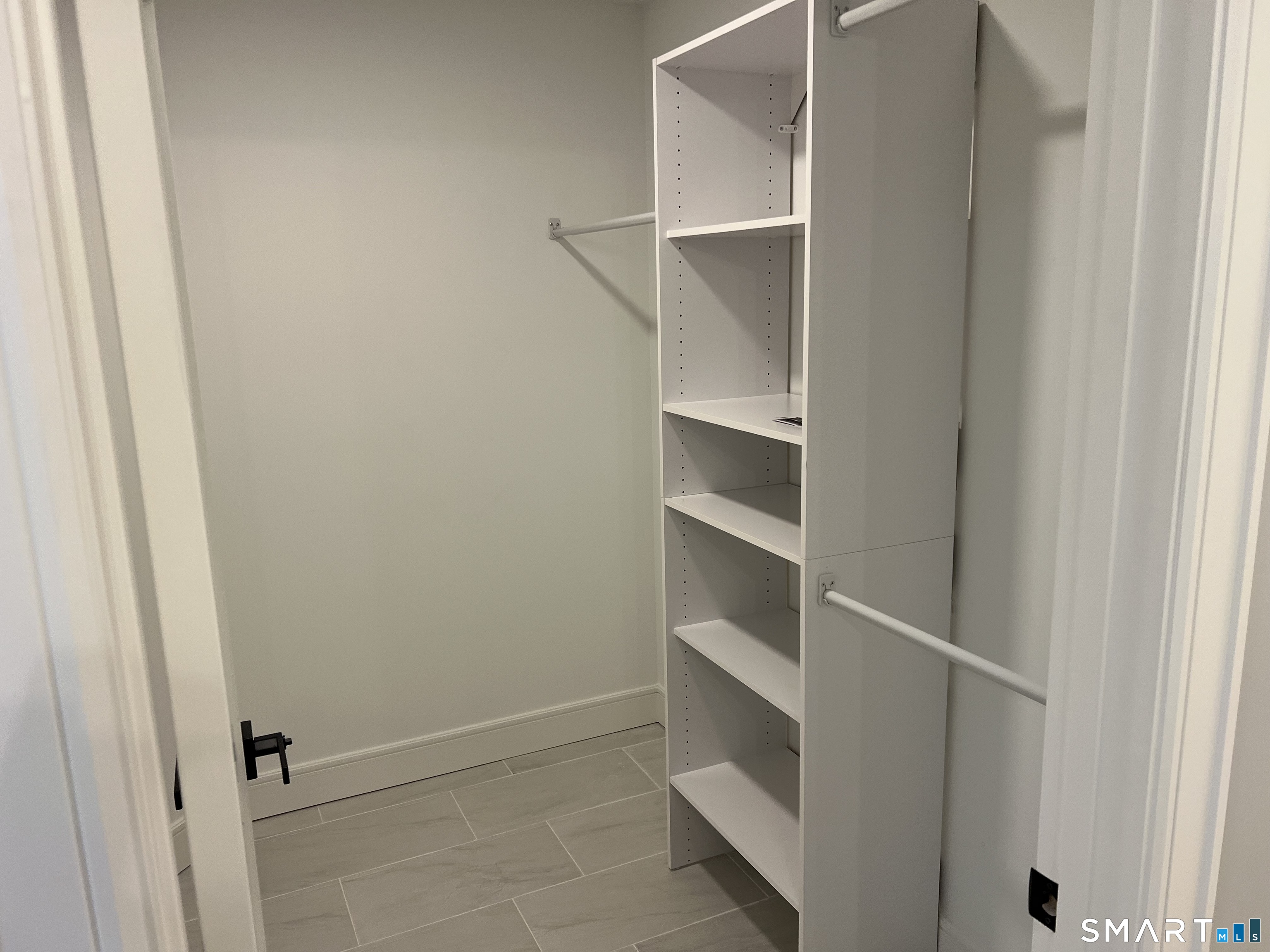 39 Lafayette Road Marlborough, CT 06447 - Photo 28 of 39 a view of walk in closet with empty racks