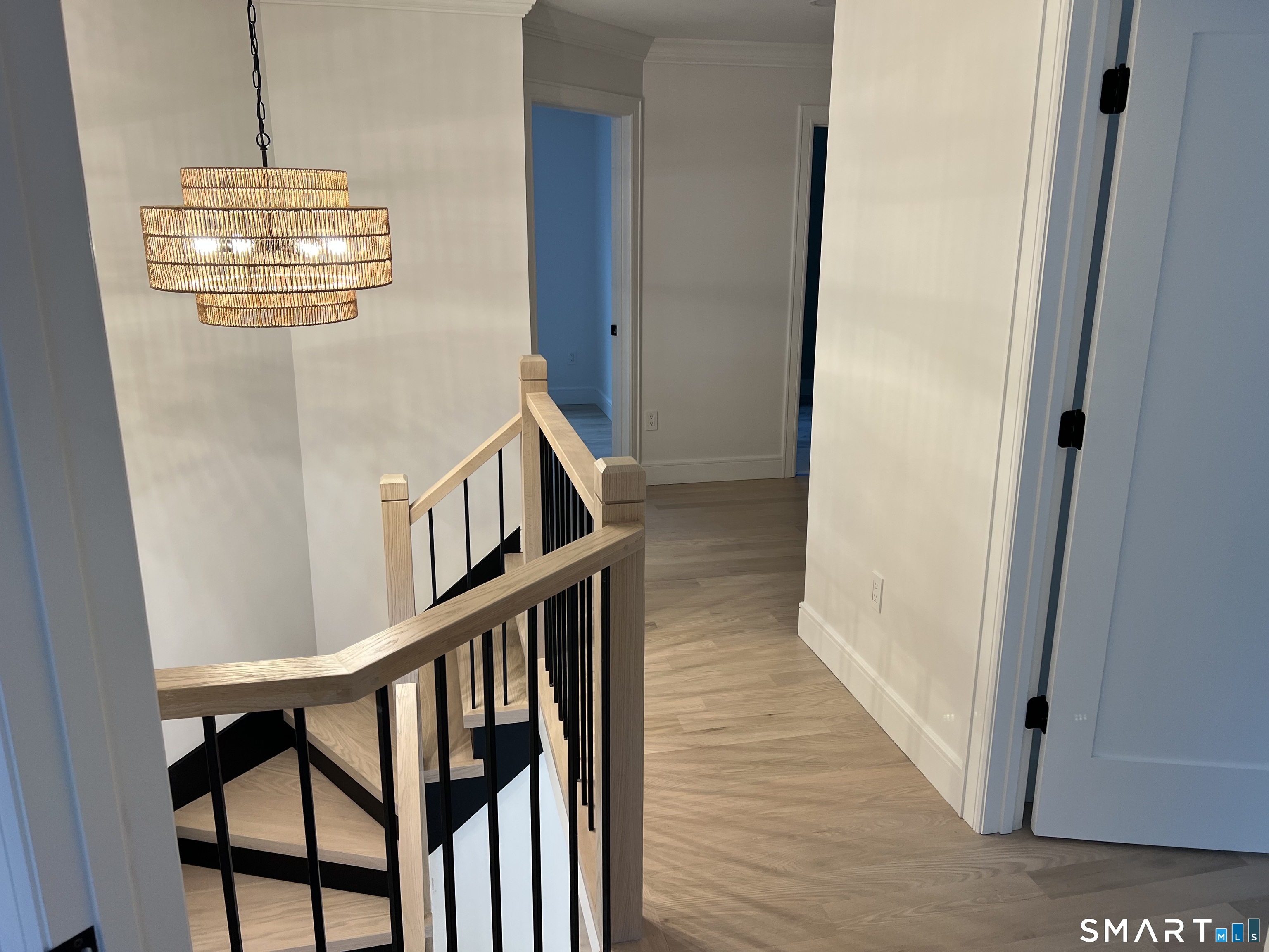 39 Lafayette Road Marlborough, CT 06447 - Photo 29 of 39 a view of an entryway wooden floor and chandelier