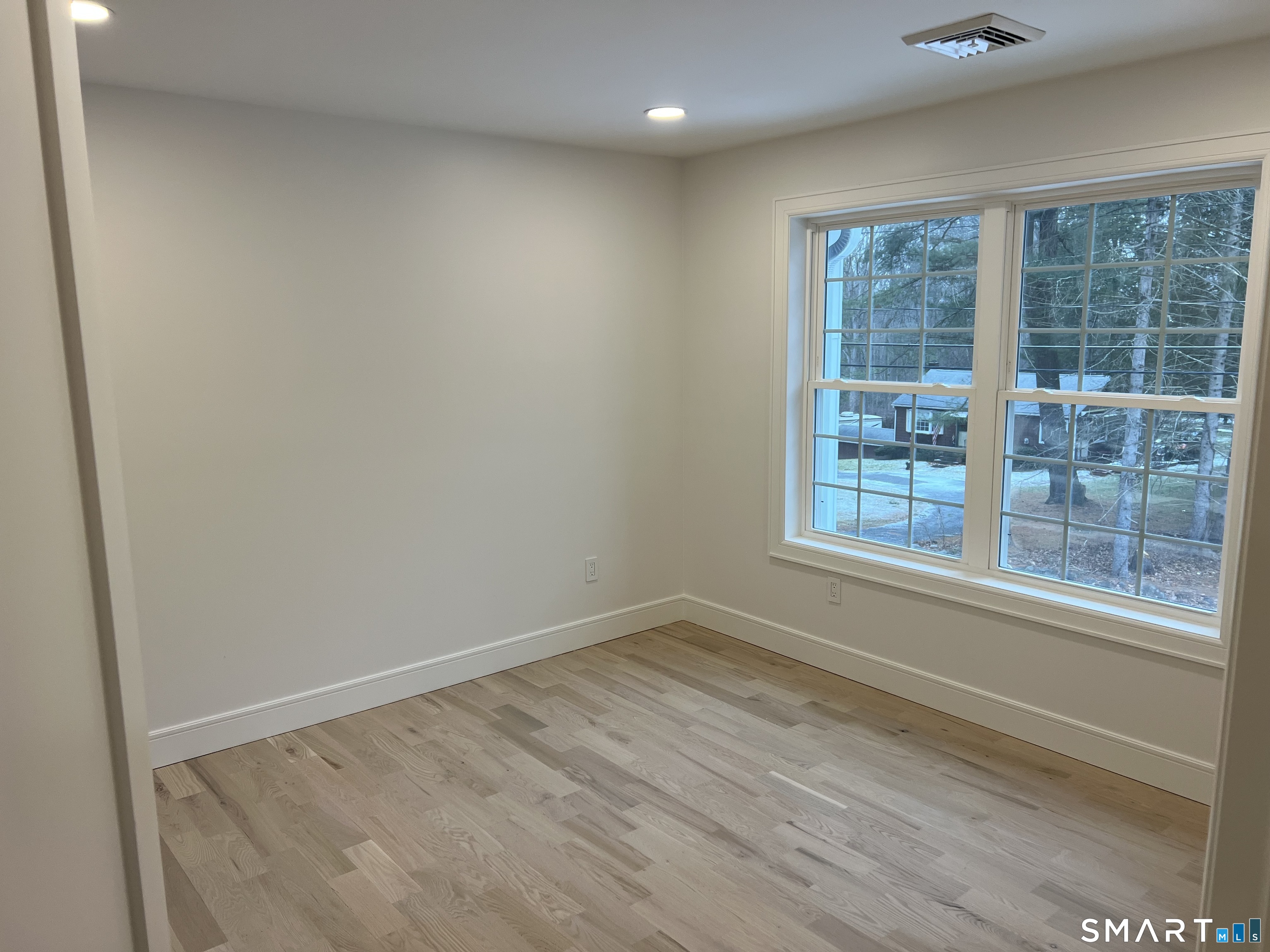 39 Lafayette Road Marlborough, CT 06447 - Photo 30 of 39 an empty room with wooden floor and windows