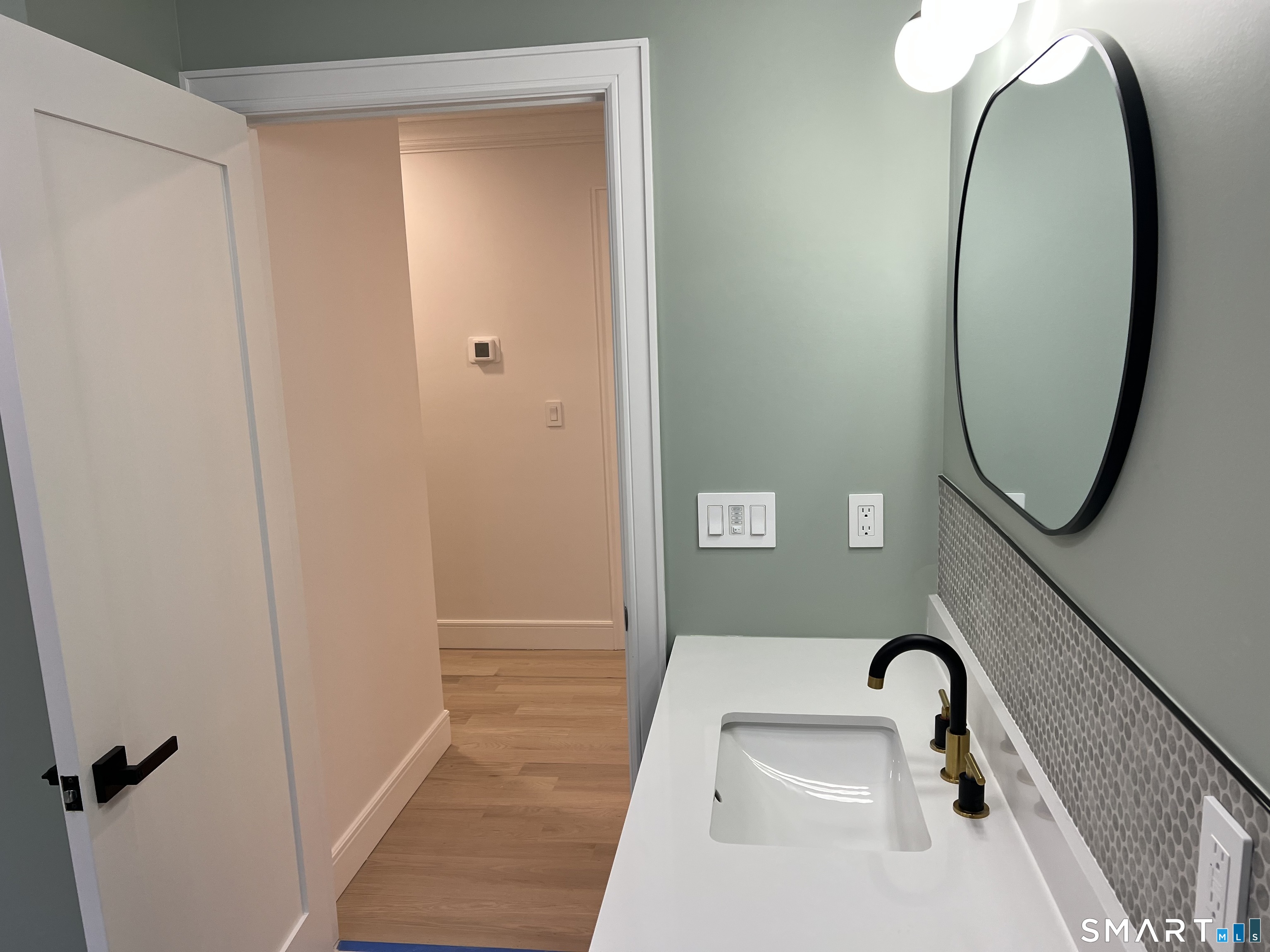 39 Lafayette Road Marlborough, CT 06447 - Photo 36 of 39 a bathroom with a sink and a mirror