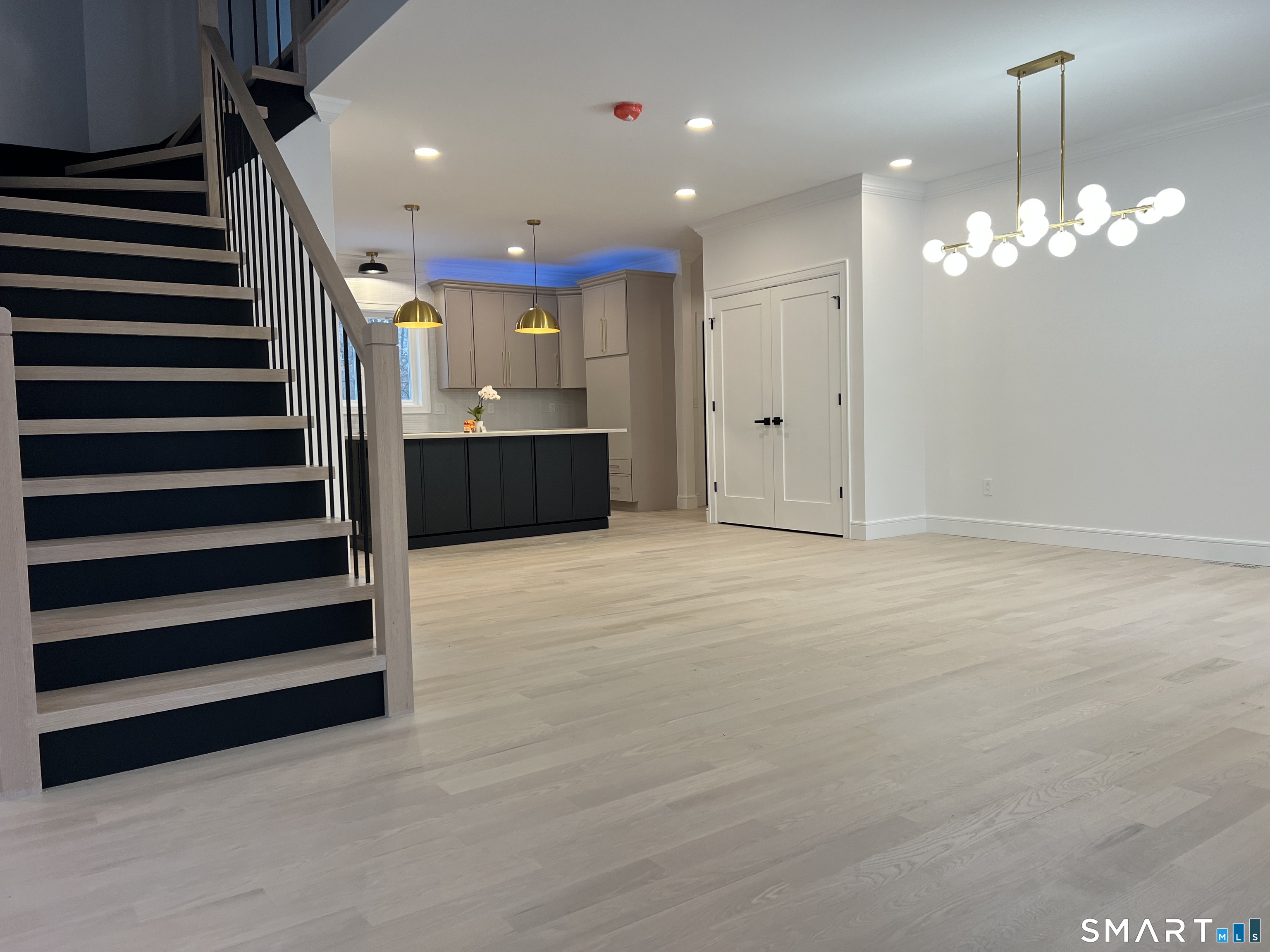 39 Lafayette Road Marlborough, CT 06447 - Photo 4 of 39 a view of a room with a projector and stairs