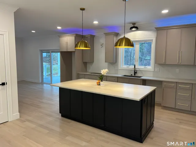 a view of a bathroom from a hallway