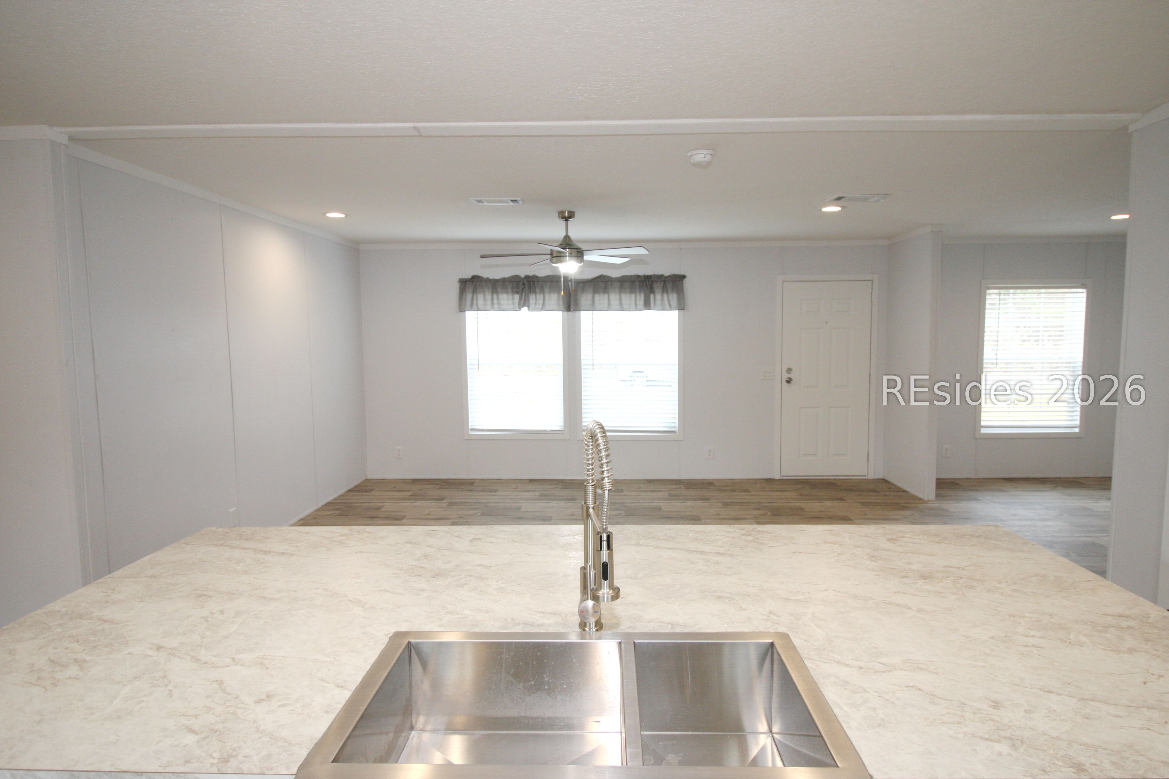 24 Unity Lane Seabrook, SC 29940 - Photo 4 of 20 Kitchen to living