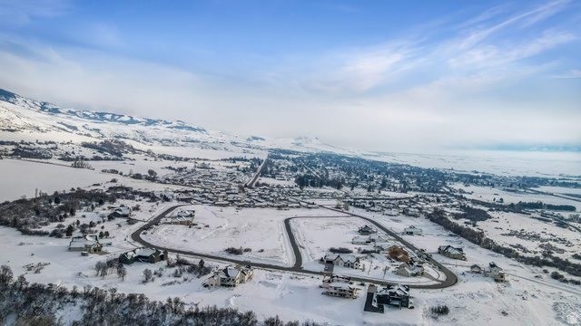 681 Cherry Ridge Lane, Unit 45 Richmond, UT 84333 - Photo 10 of 10 Snowy aerial view featuring a mountain view