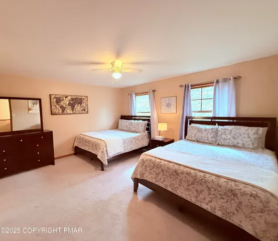 a bedroom with a bed and furniture