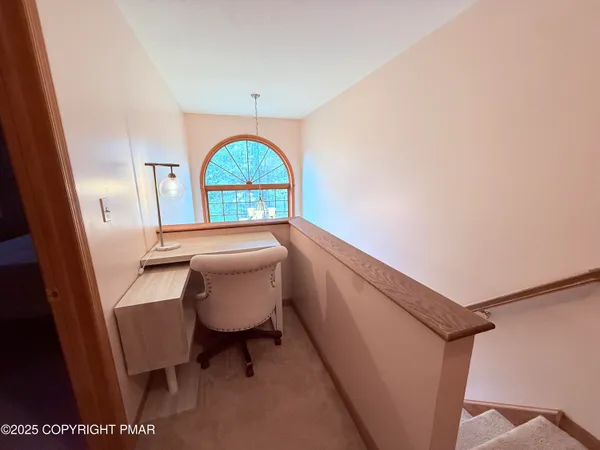 a bed room with a bed and a window