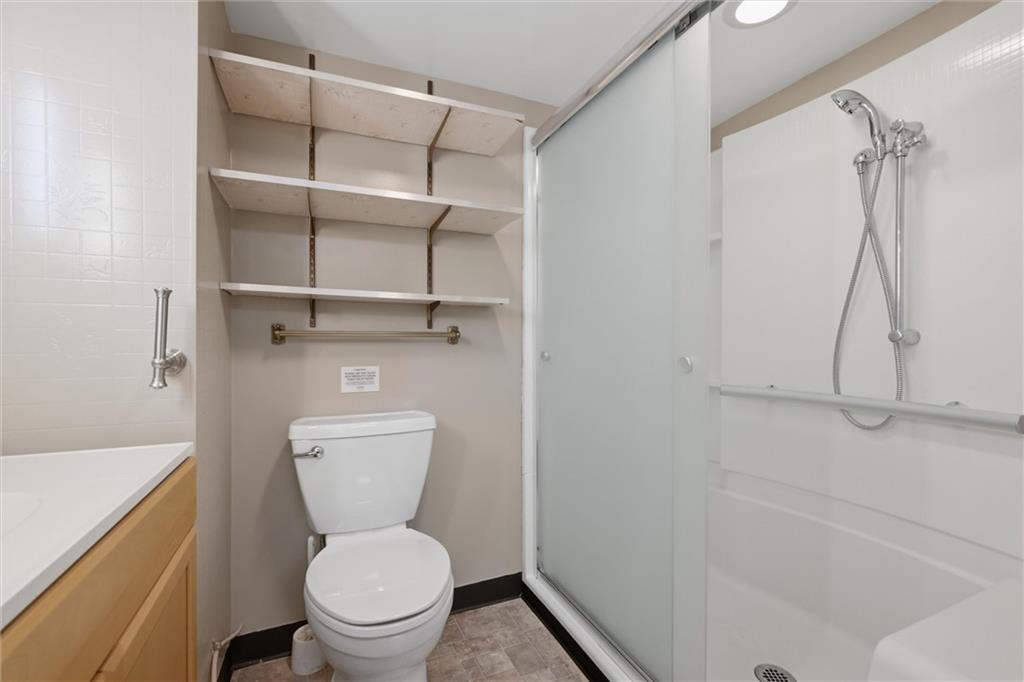 133 Beatty Street Apollo, PA 15613 - Photo 29 of 36 a white toilet sitting next to a bathroom sink