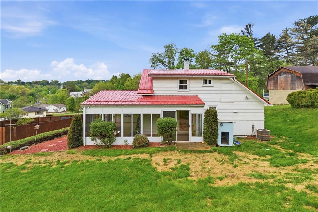 133 Beatty Street Apollo, PA 15613 - Photo 5 of 36 a front view of a house with garden