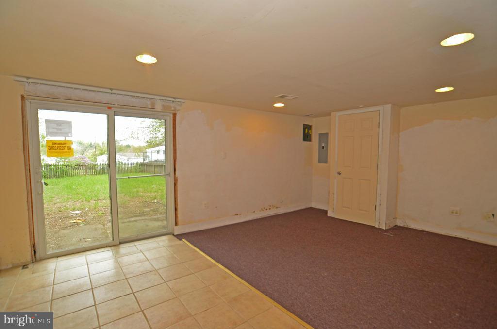 4618 Tema Road Pikesville, MD 21208 - Photo 17 of 29 a view of an empty room with a window