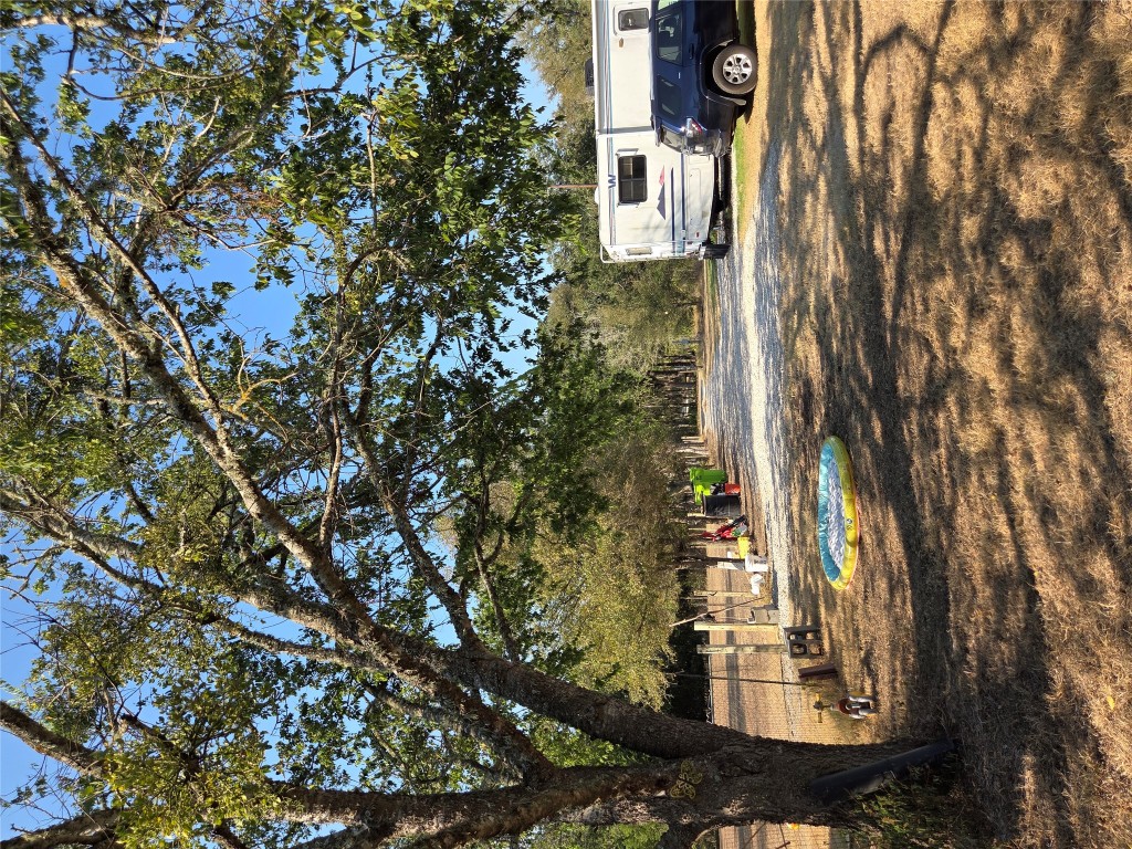 150 Beaver Road Elgin, TX 78621 - Photo 12 of 40 a view of street with trees