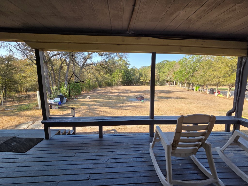 150 Beaver Road Elgin, TX 78621 - Photo 15 of 40 a view of a floor to ceiling window with wooden floor