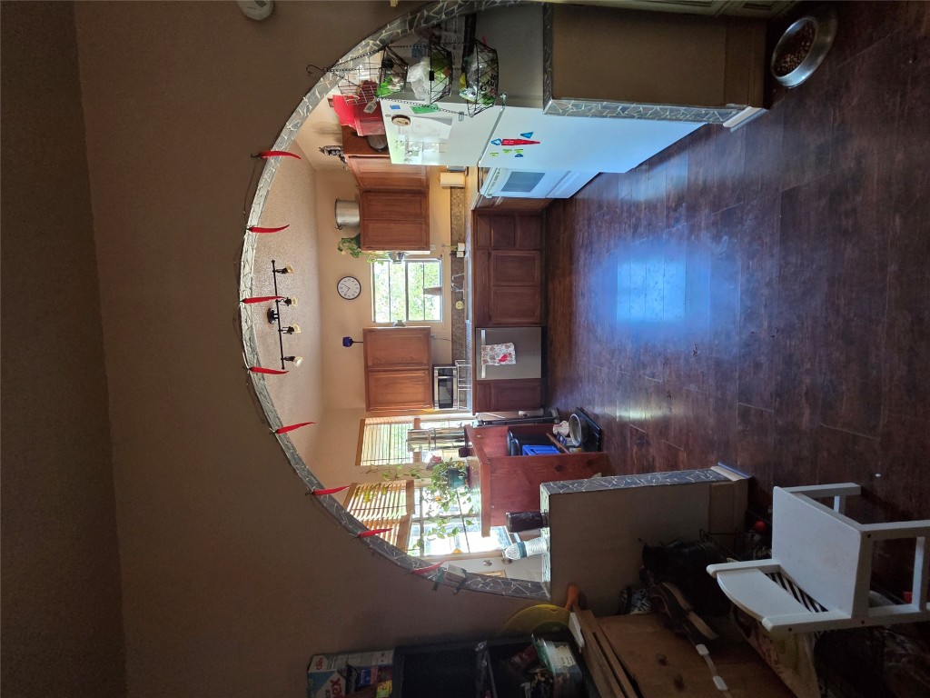 150 Beaver Road Elgin, TX 78621 - Photo 19 of 40 a living room with furniture and kitchen view