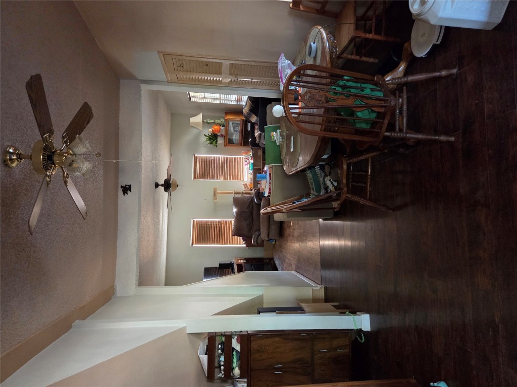 150 Beaver Road Elgin, TX 78621 - Photo 20 of 40 a view of a dining room with furniture window and wooden floor