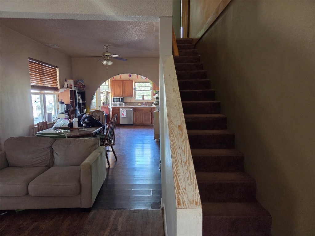 150 Beaver Road Elgin, TX 78621 - Photo 28 of 40 a living room with furniture and a fireplace