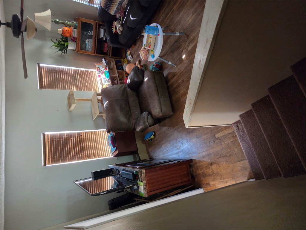 150 Beaver Road Elgin, TX 78621 - Photo 32 of 40 a living room with furniture and a window