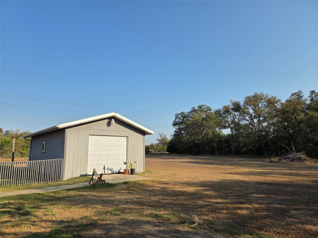 150 Beaver Road Elgin, TX 78621 - Photo 34 of 40 a view of a house with backyard and trees