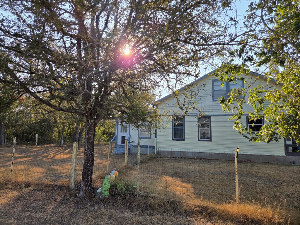 150 Beaver Road Elgin, TX 78621 - Photo 8 of 40 a front view of a house with garden