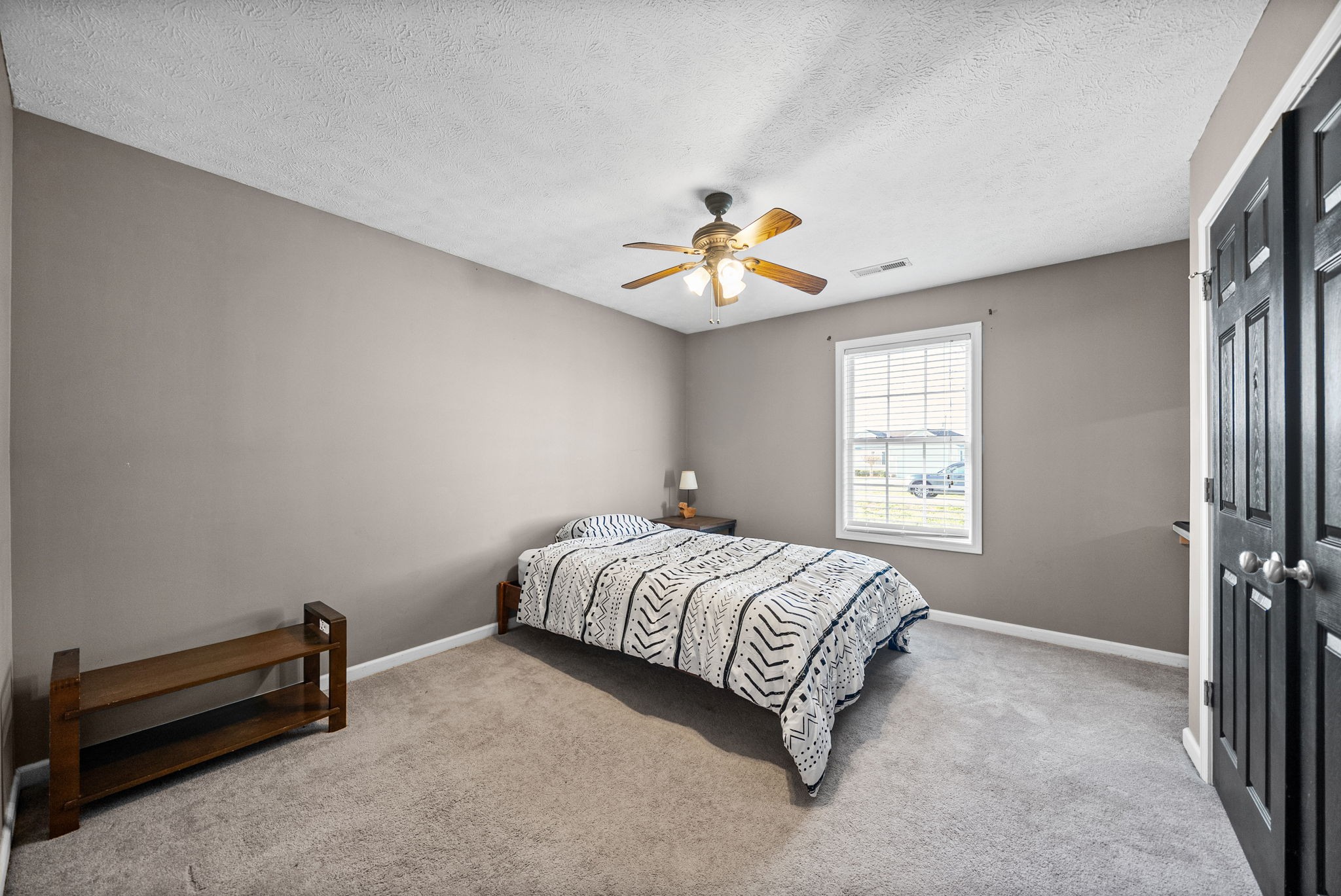 1940 Loop Lane Gracey, KY 42232 - Photo 20 of 32 a bedroom with a bed and a window