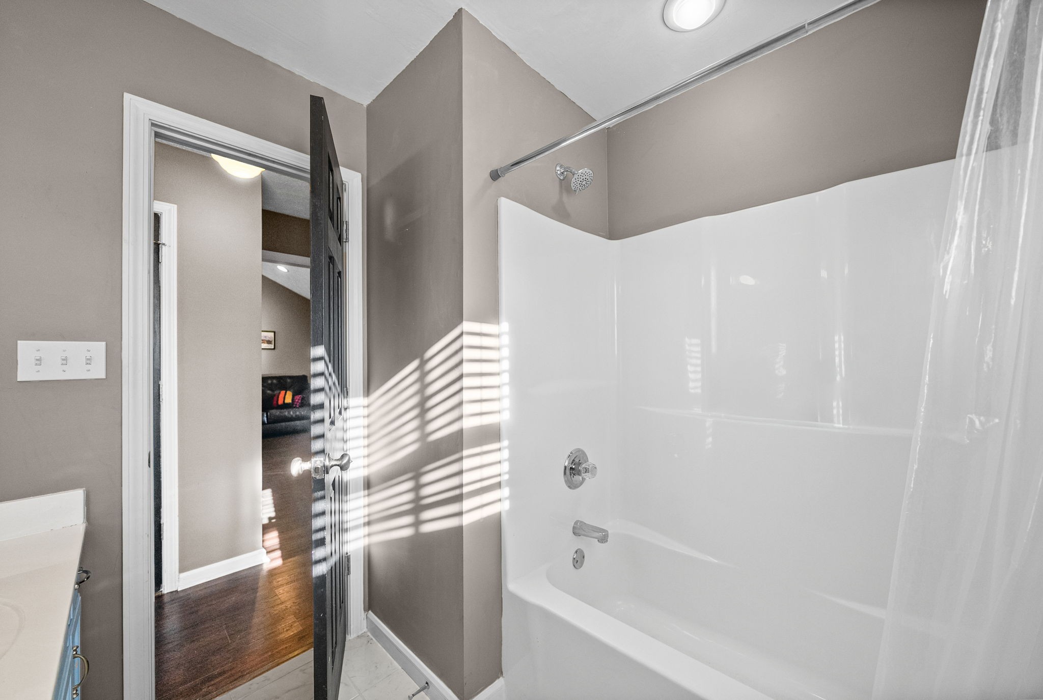 1940 Loop Lane Gracey, KY 42232 - Photo 23 of 32 a bathroom with a bathtub and a shower