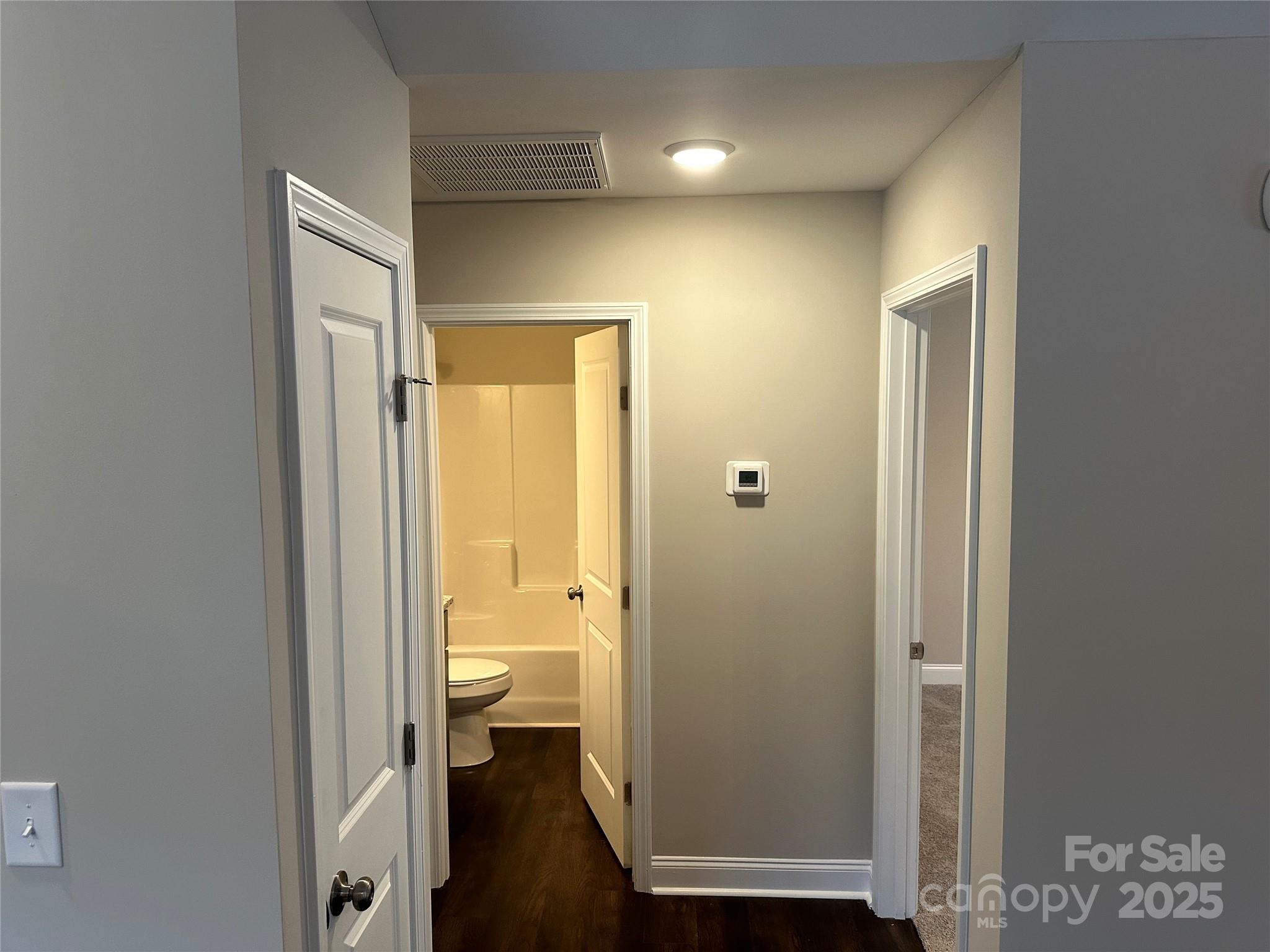 203 Bennett Street Wadesboro, NC 28170 - Photo 6 of 12 a bathroom that has a toilet in it