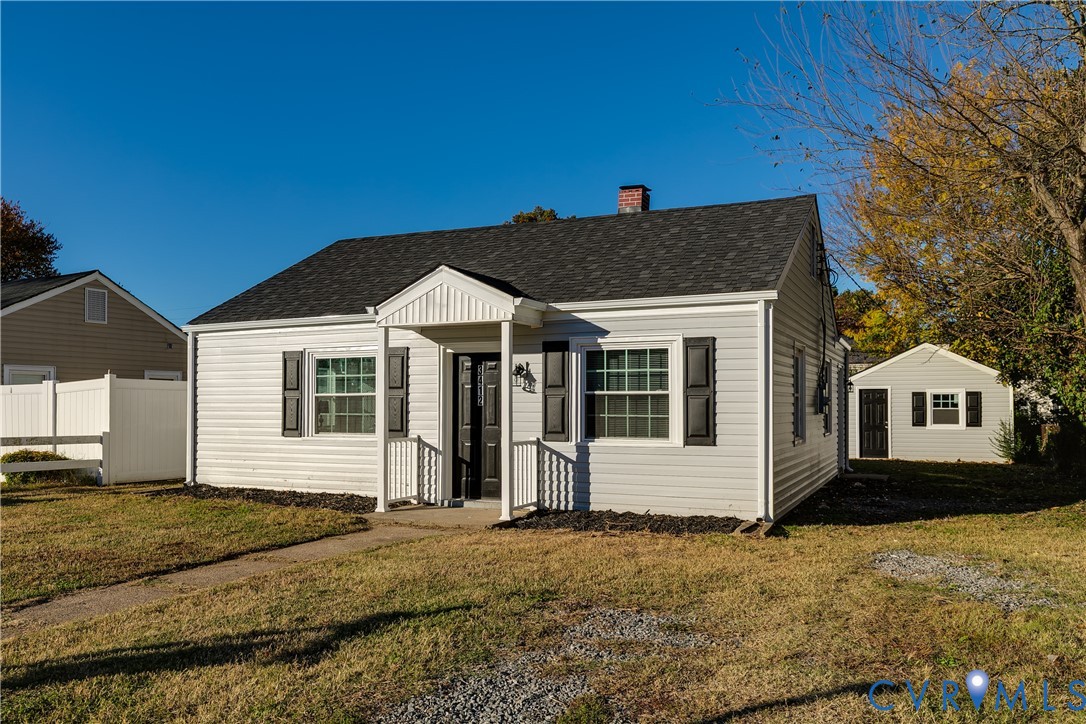 3412 Reynolds Road Richmond, VA 23223 - Photo 3 of 31 Bungalow-style house featuring a chimney and roof