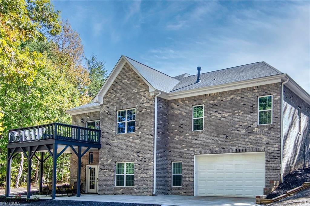 6410 Hampton Road Clemmons, NC 27012 - Photo 4 of 27 lower level workshop with 3 car in-line garage