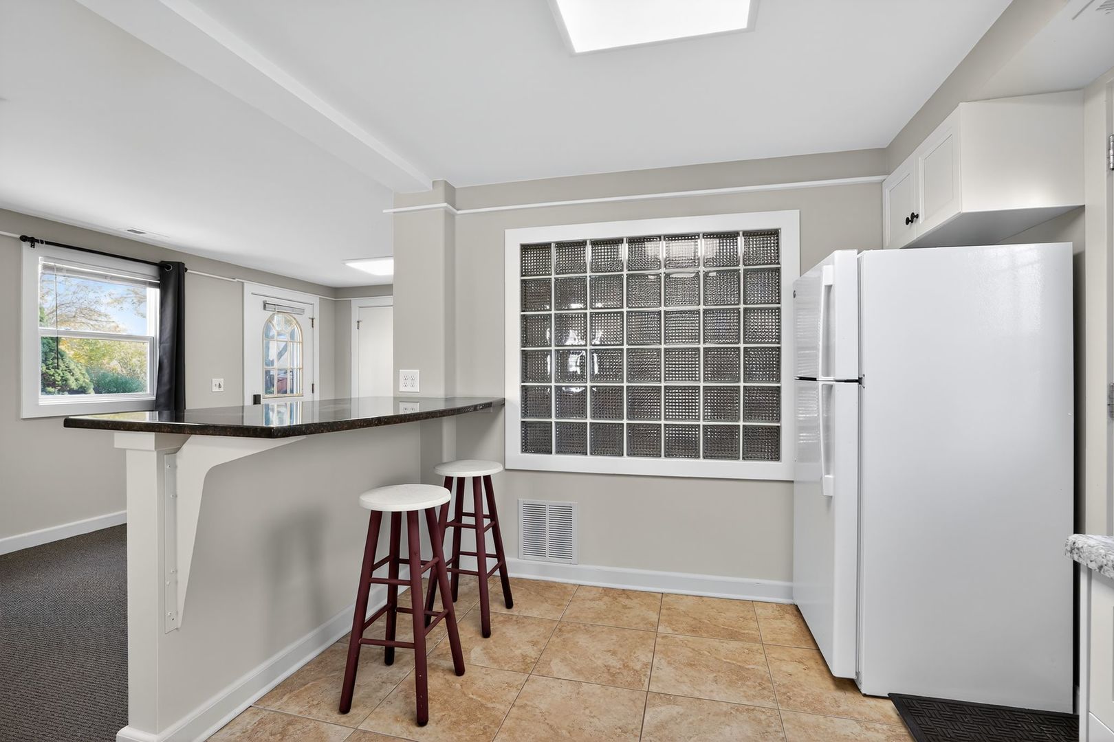 1036 Guerin Road, Unit B Green Oaks, IL 60048 - Photo 11 of 17 a view of room with window and wooden floor