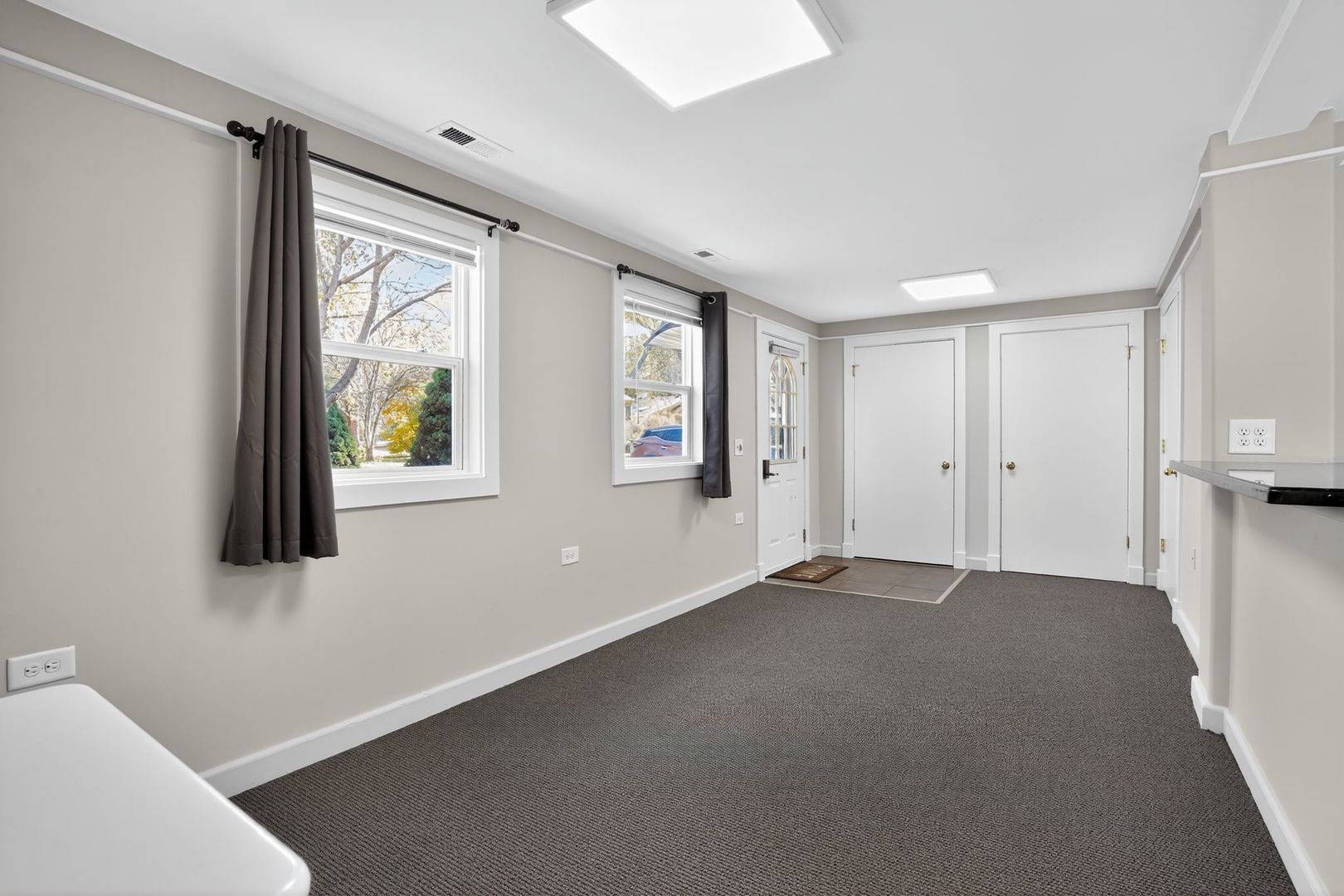 1036 Guerin Road, Unit B Green Oaks, IL 60048 - Photo 7 of 17 a view of an empty room with a window
