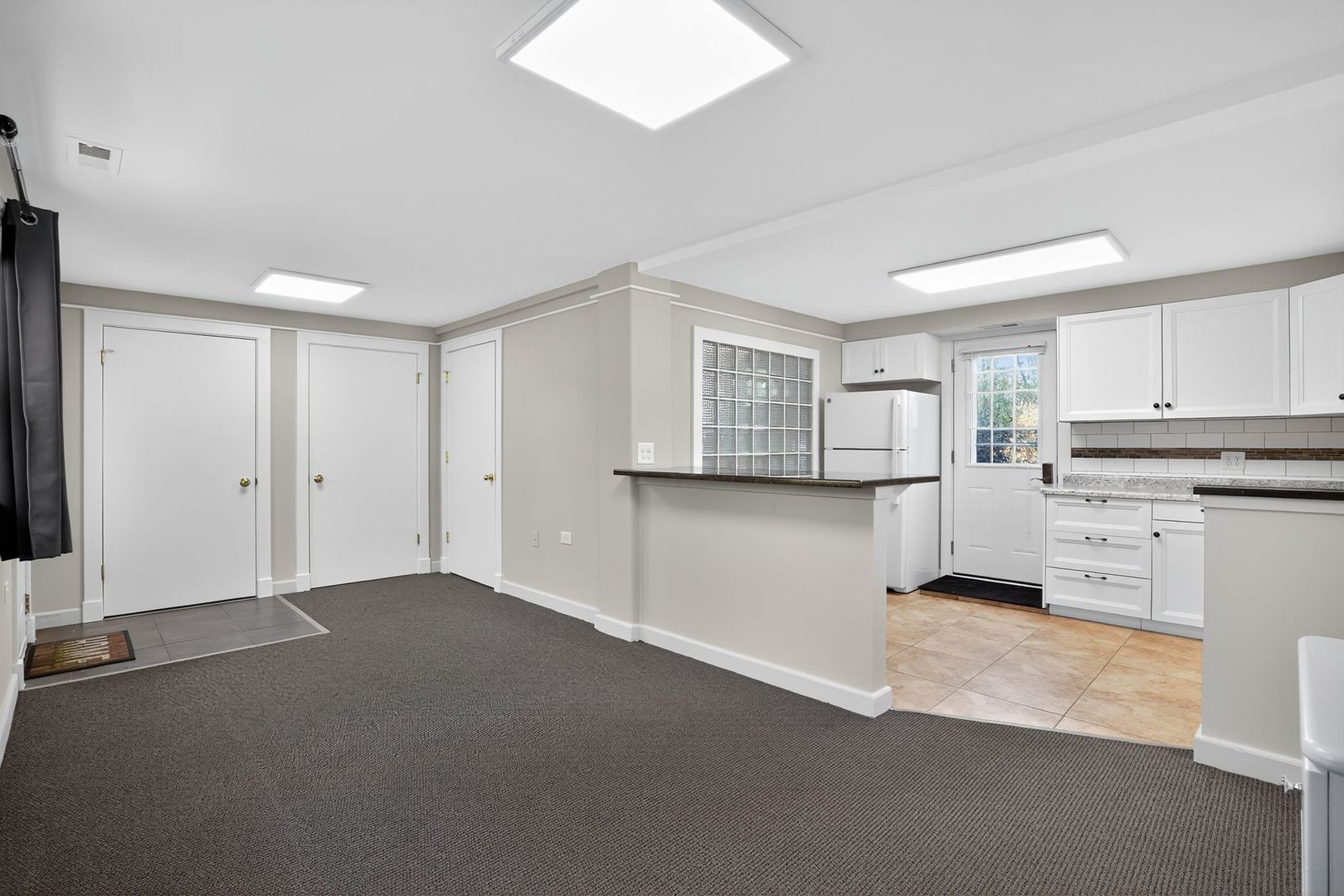 1036 Guerin Road, Unit B Green Oaks, IL 60048 - Photo 10 of 17 a view of kitchen with granite countertop cabinets and refrigerator
