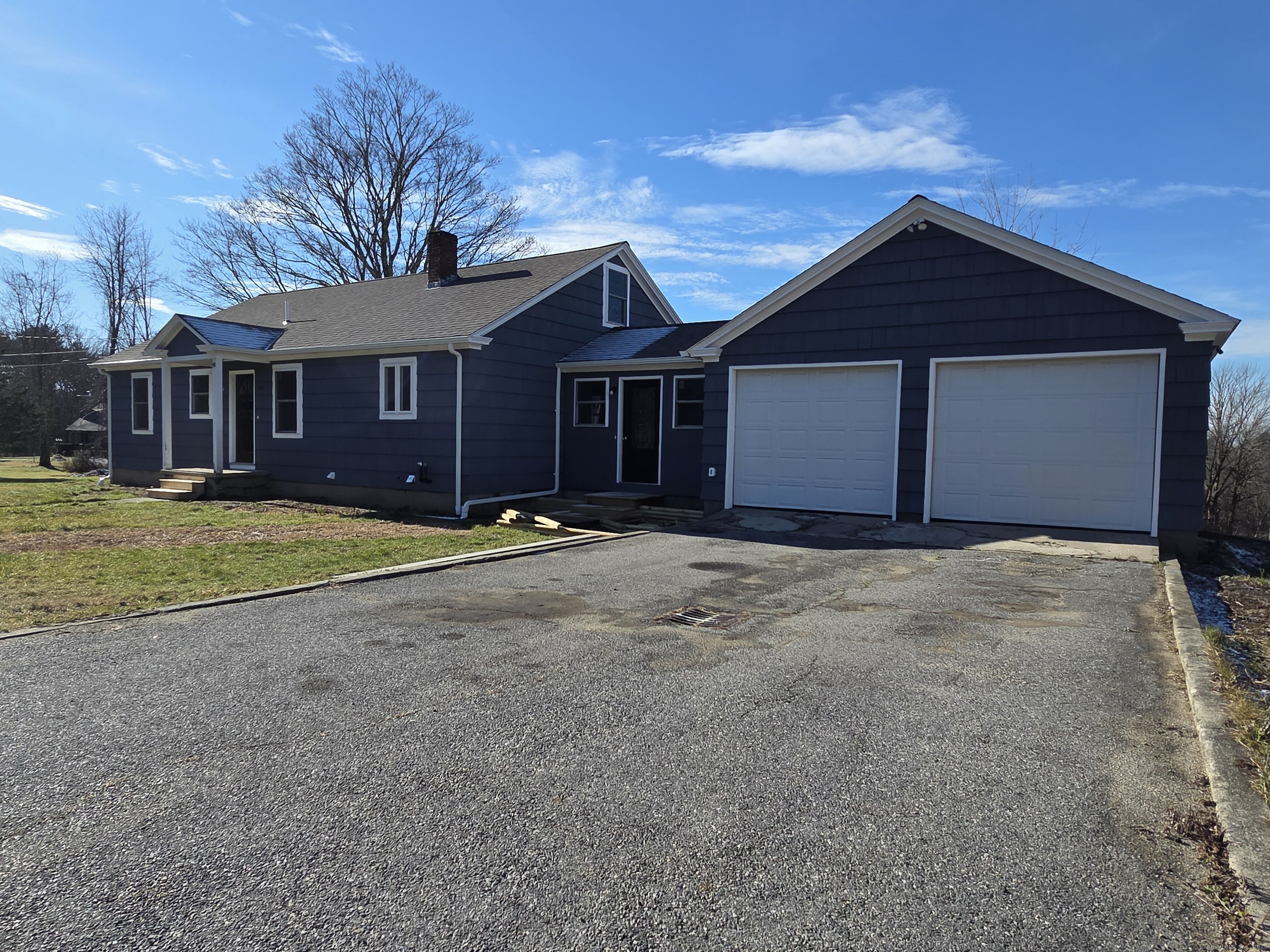 395 Bailey Hill Road Killingly, CT 06239 - Photo 2 of 36 a view of a house with a yard and large tree