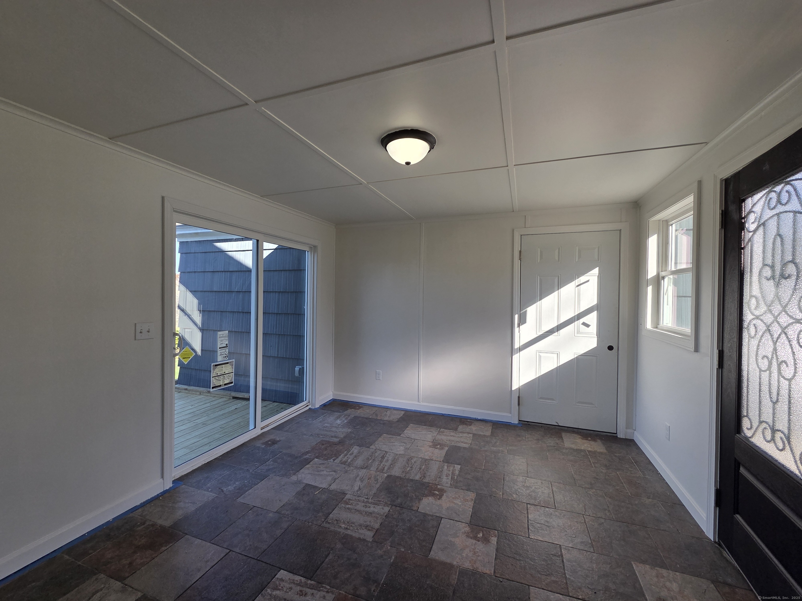 395 Bailey Hill Road Killingly, CT 06239 - Photo 3 of 36 a view of empty room with floor to ceiling window