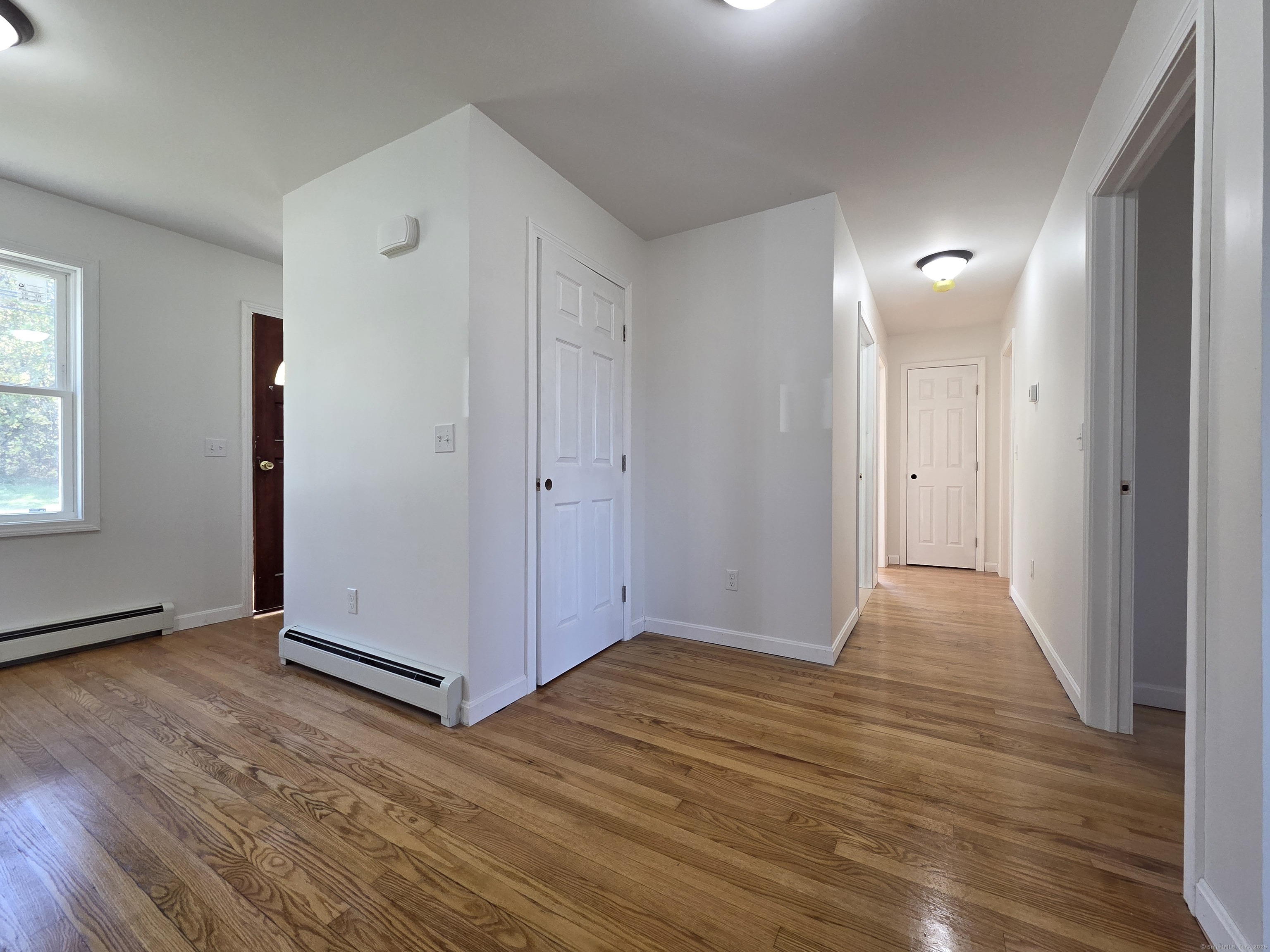 395 Bailey Hill Road Killingly, CT 06239 - Photo 9 of 36 a view of entryway with wooden floor