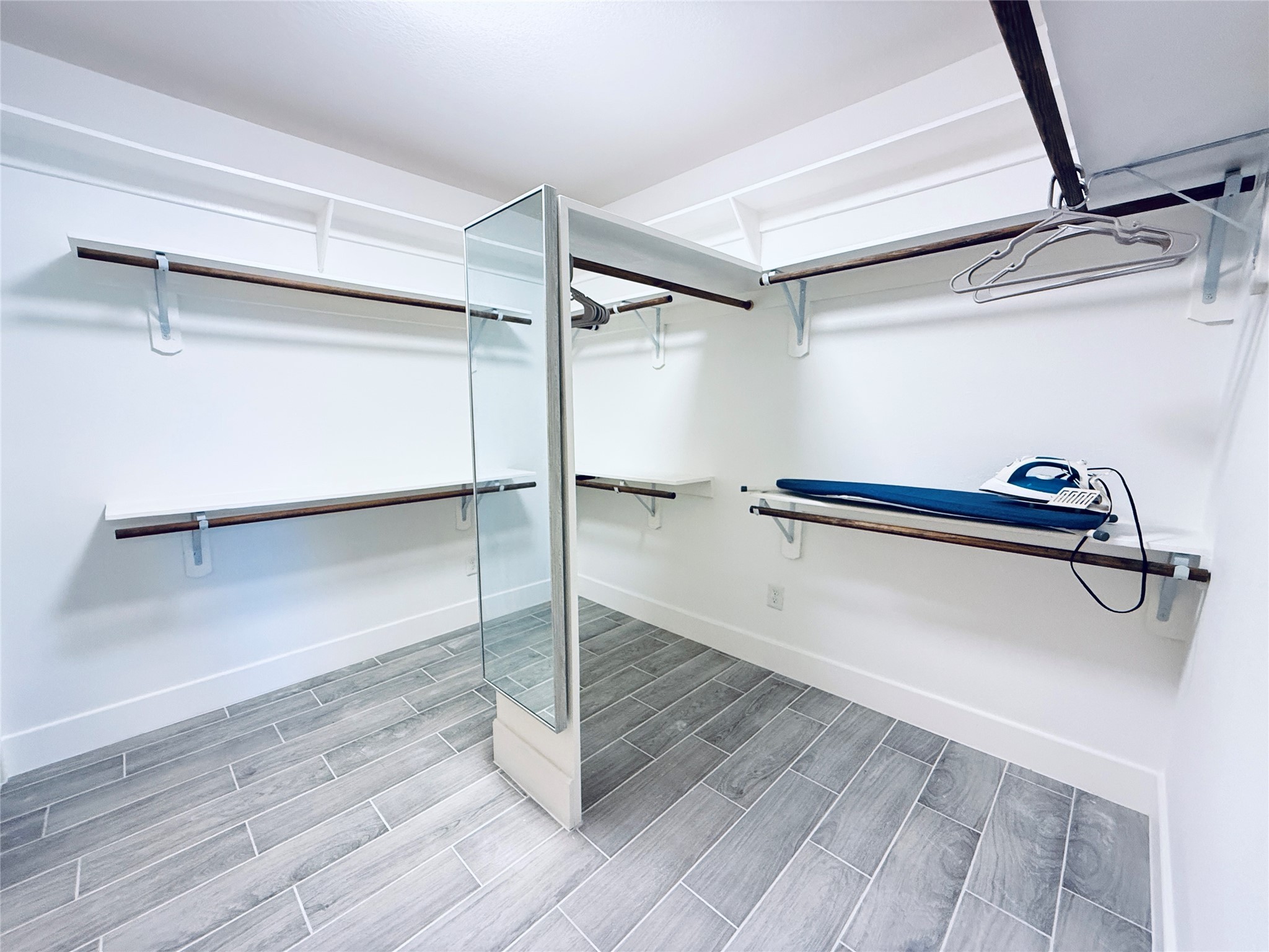 3936 Wagon Road Dickinson, TX 77539 - Photo 22 of 45 a view of a room with wooden floor