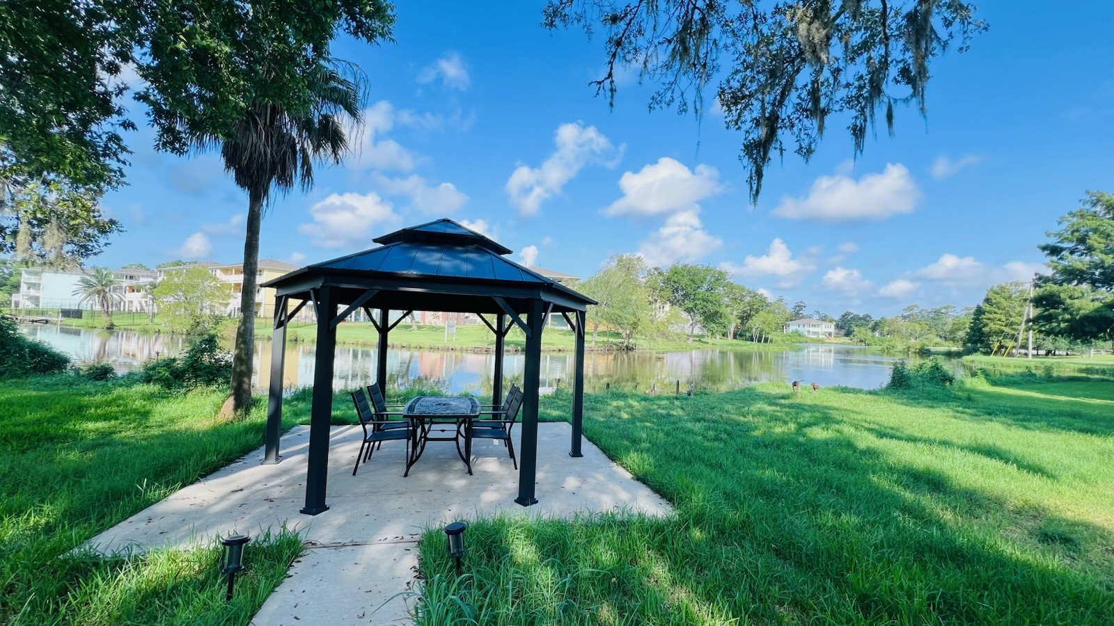 3936 Wagon Road Dickinson, TX 77539 - Photo 43 of 45 a garden view with a seating space
