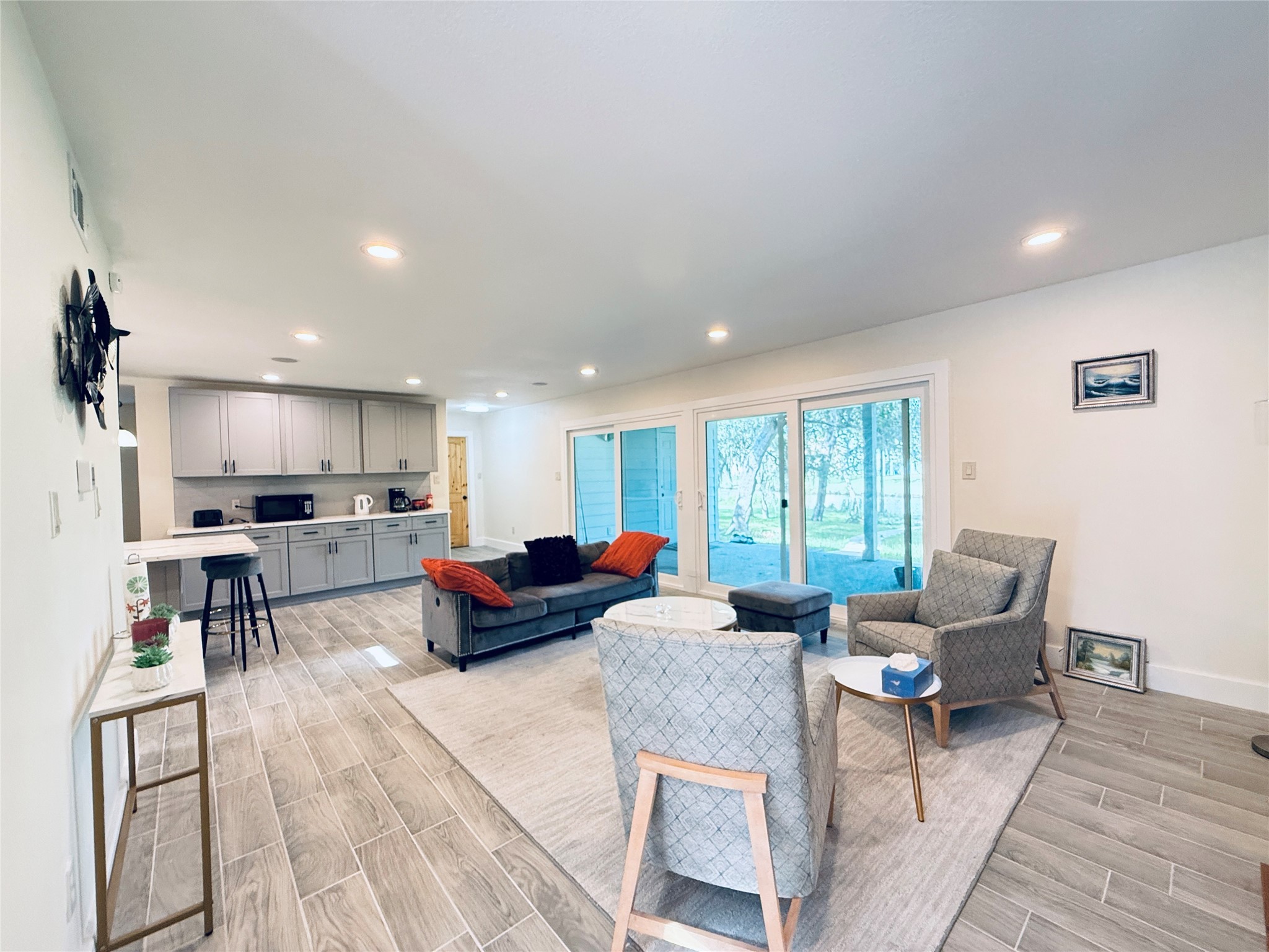 3936 Wagon Road Dickinson, TX 77539 - Photo 10 of 45 a living room with furniture kitchen view and a window