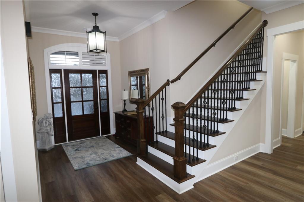 3251 Lenora Church Road Snellville, GA 30039 - Photo 14 of 48 a view of entryway and hall with wooden floor