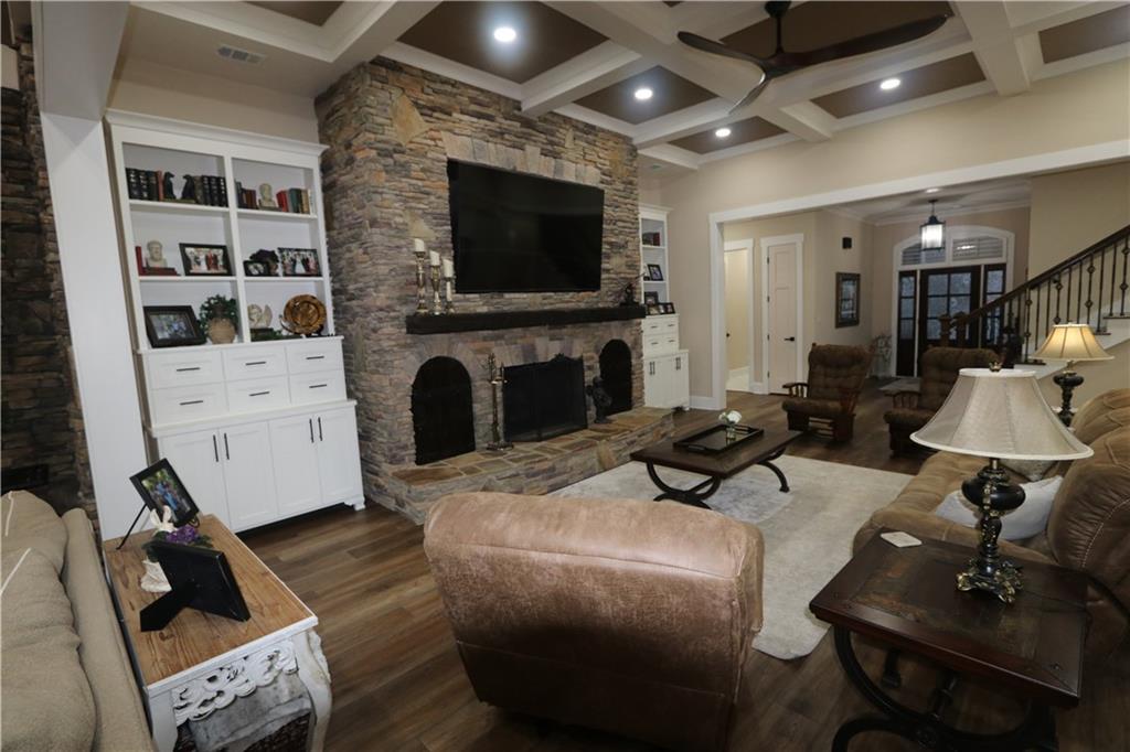 3251 Lenora Church Road Snellville, GA 30039 - Photo 17 of 48 a living room with furniture and a flat screen tv