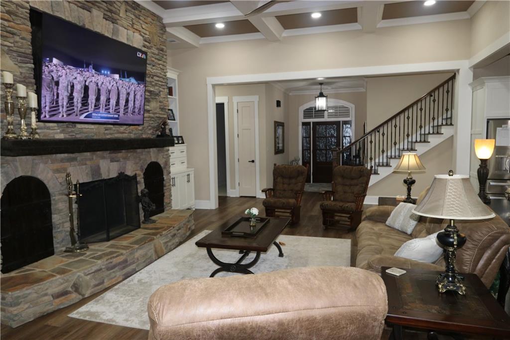 3251 Lenora Church Road Snellville, GA 30039 - Photo 18 of 48 a living room with furniture and a fireplace