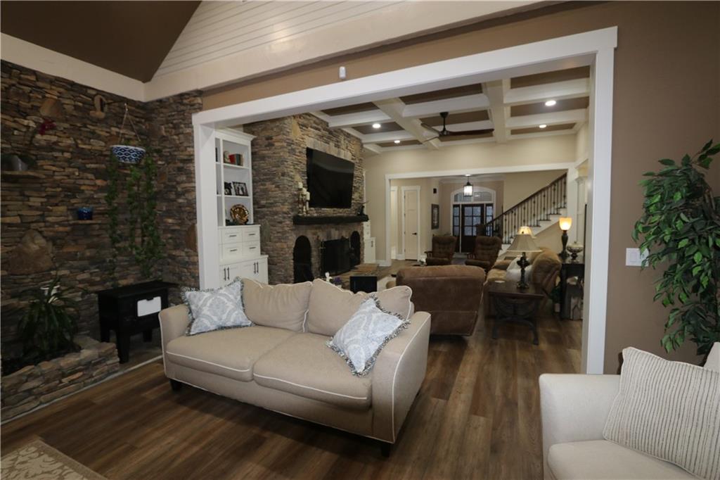 3251 Lenora Church Road Snellville, GA 30039 - Photo 22 of 48 a living room with furniture and a fireplace