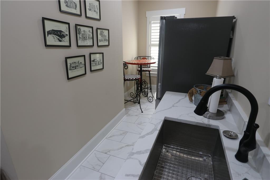 3251 Lenora Church Road Snellville, GA 30039 - Photo 28 of 48 a view of a living room and bathroom