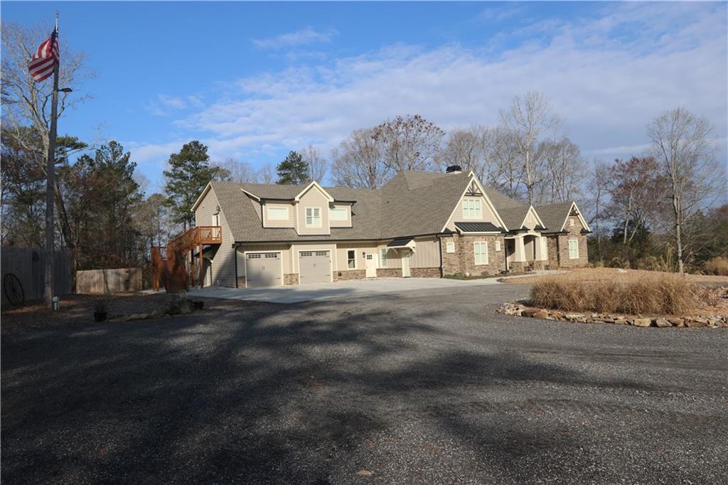 3251 Lenora Church Road Snellville, GA 30039 - Photo 3 of 48 a view of a town with large trees