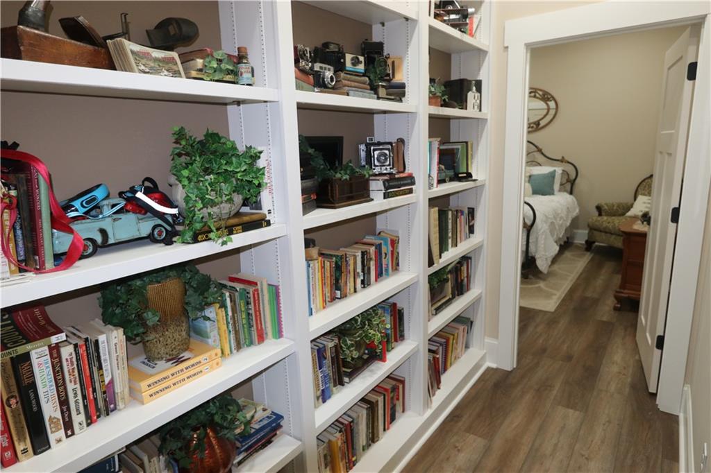 3251 Lenora Church Road Snellville, GA 30039 - Photo 36 of 48 a view of walk in closet with clothes and shoes