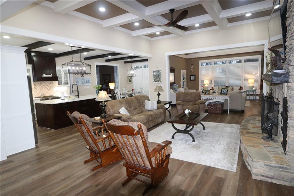 3251 Lenora Church Road Snellville, GA 30039 - Photo 7 of 48 a living room with lots of furniture and a large window