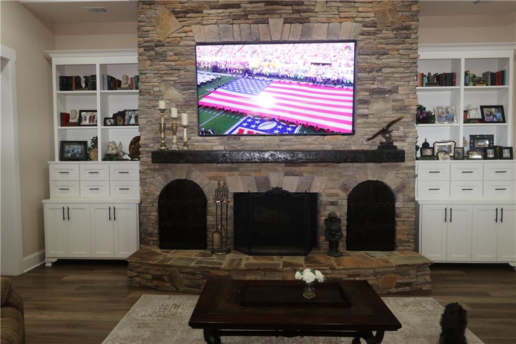 3251 Lenora Church Road Snellville, GA 30039 - Photo 9 of 48 a living room with furniture and a fireplace