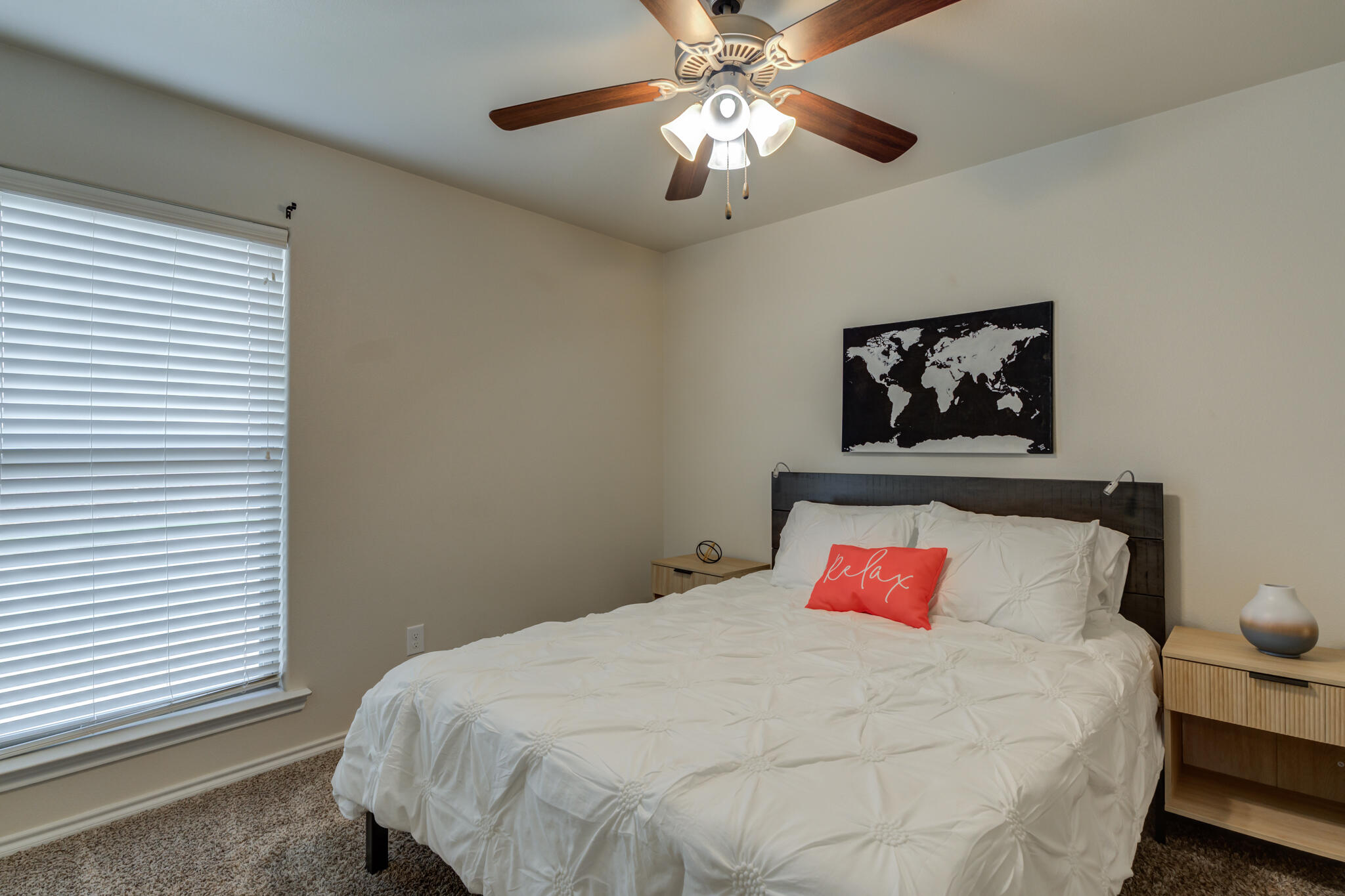 7201 94th Street Lubbock, TX 79424 - Photo 29 of 34 a bedroom with a bed and a chandelier