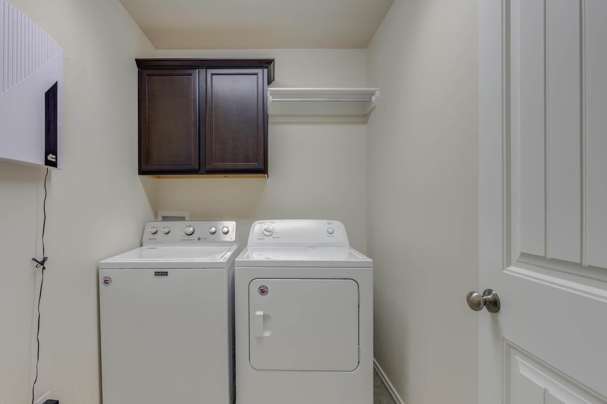 7201 94th Street Lubbock, TX 79424 - Photo 31 of 34 a utility room with dryer and washer