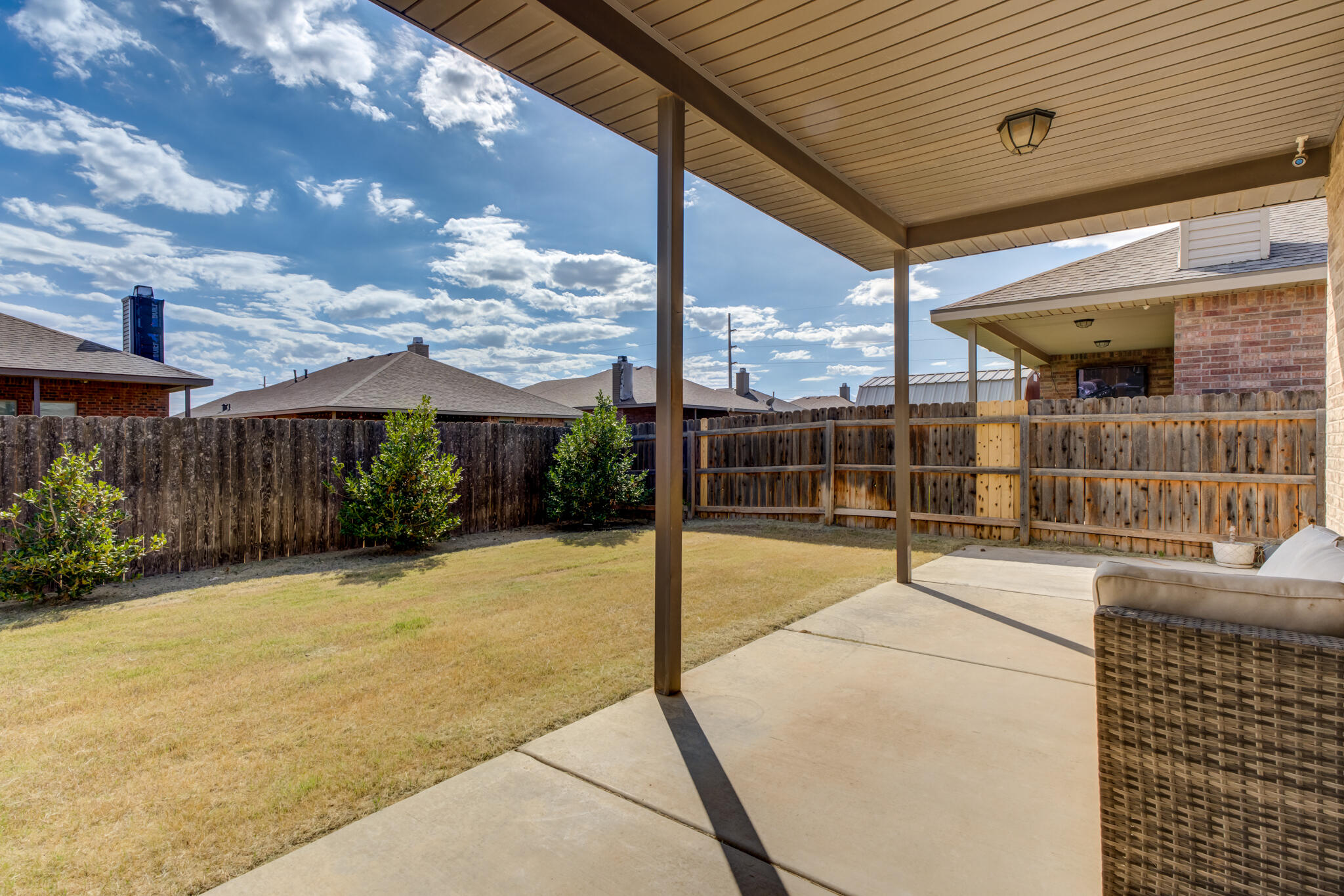 7201 94th Street Lubbock, TX 79424 - Photo 32 of 34 a view of a backyard with sitting area